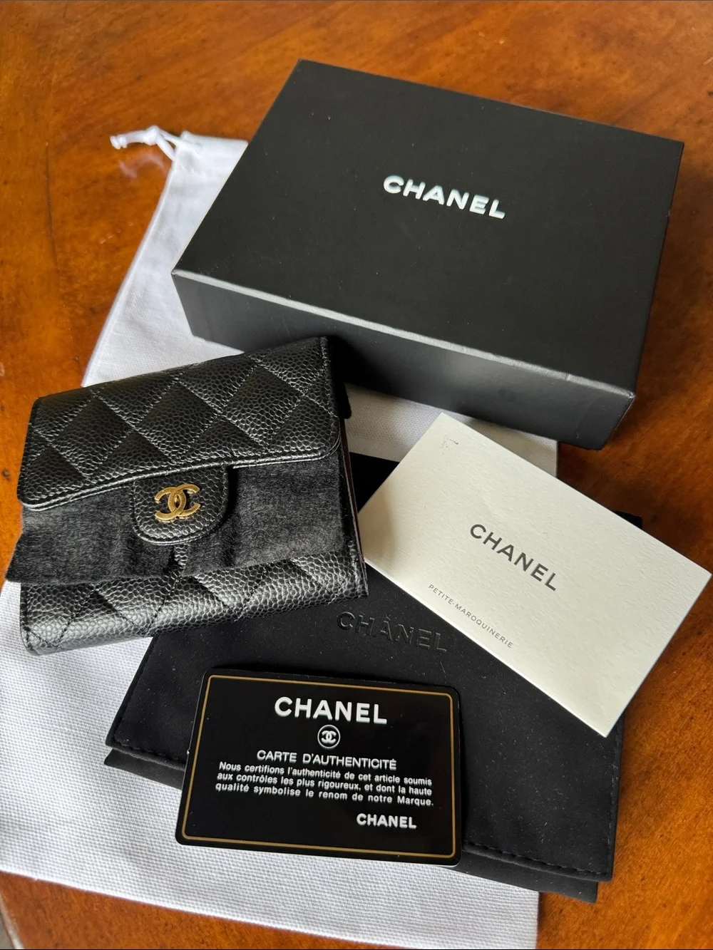 CHANEL Black Quilted Caviar Leather Wallet with Gold CC